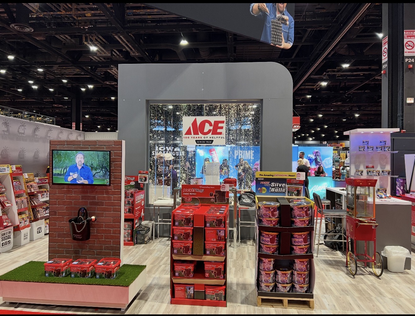 TeleBrands’ Ace show booth with Pocket Hose displays, product demonstrations and Ace’s centennial sign