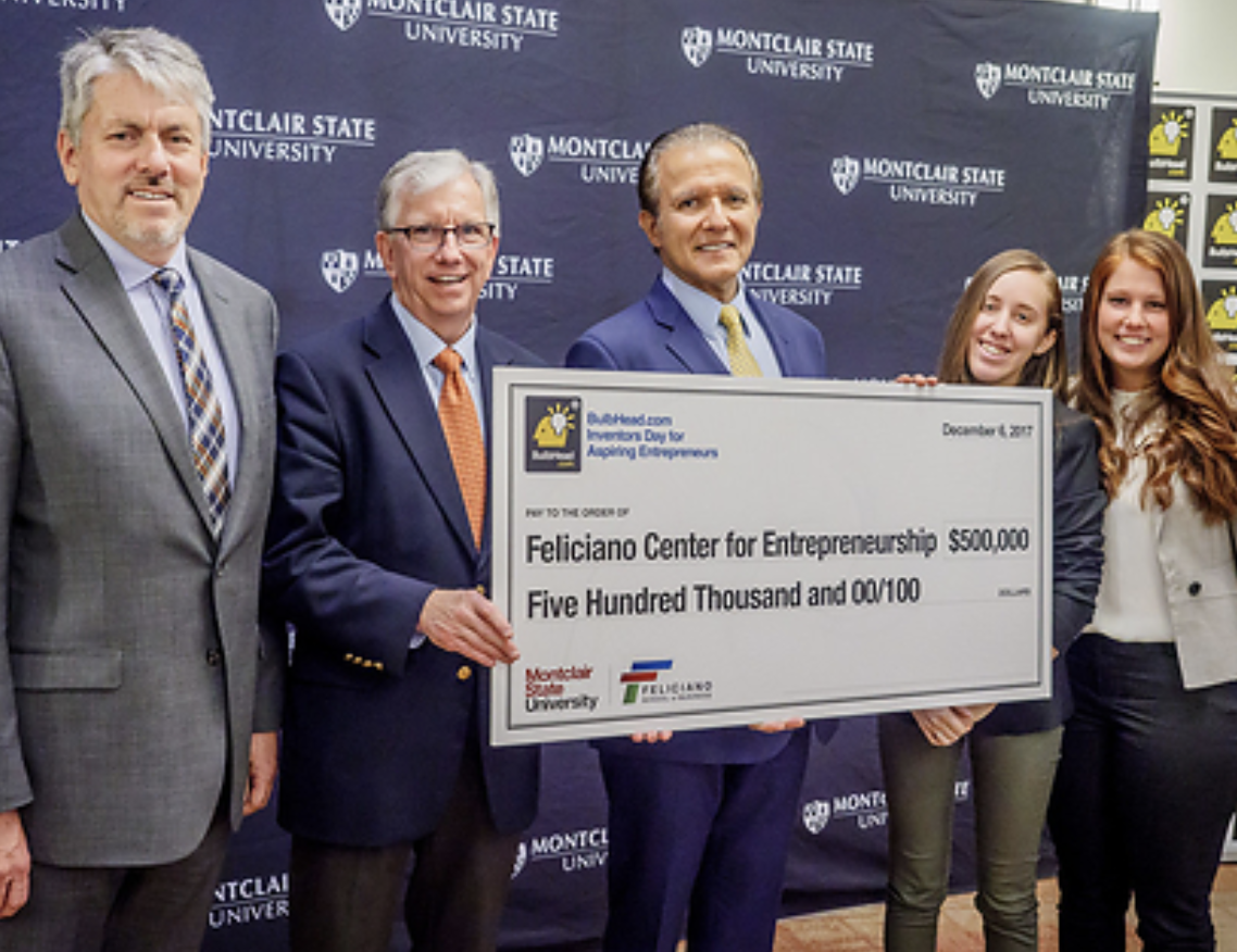 AJ Khubani presenting a $500,000 check to Montclair State’s Feliciano Center for Entrepreneurship, with university leaders and student entrepreneurs